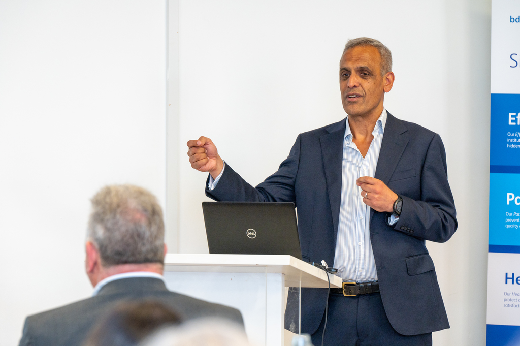 Image of Dr Taj Hassan speaking