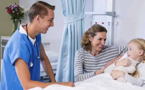 Doctor consulting with parent and child